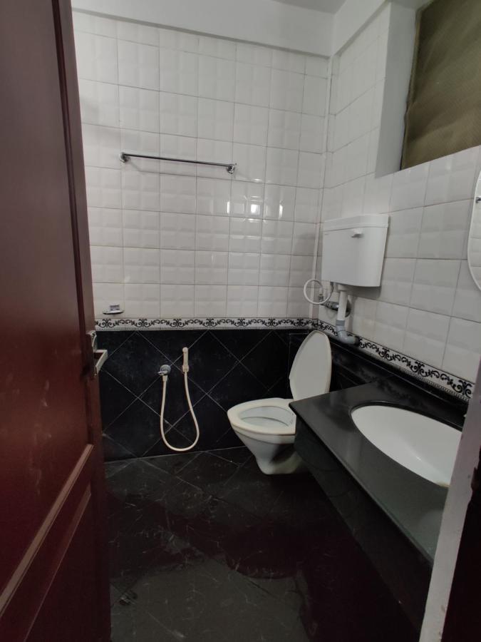 Amruth Inn Guruvāyūr Buitenkant foto
